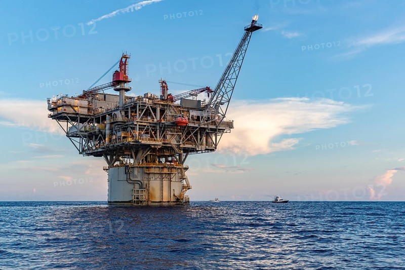 Private fishing boats near offshore petroleum drilling rig in the Gulf of Mexico