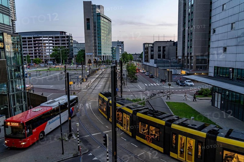 Utrecht city centre, high-rise office and residential buildings on Jaarbeursplein, at Utrecht Centraal railway station, trams, public transport stop, Netherlands