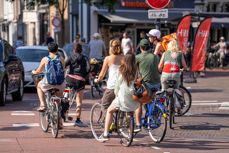 Cycling in the Netherlands, Utrecht, typical riding style with 2 people on one bike
