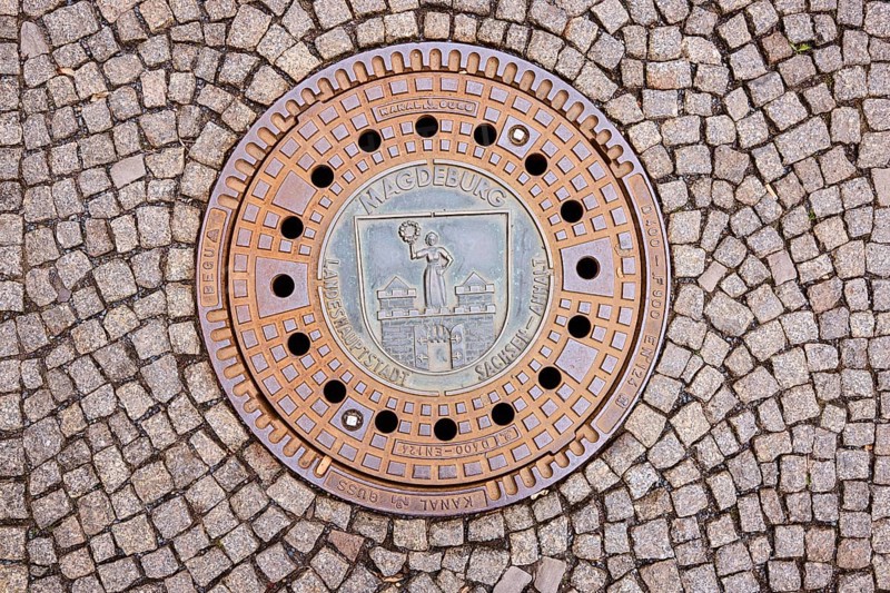 Manhole covers, paving stones, Magdeburg, state capital, independent city, Saxony-Anhalt, Germany, Europe