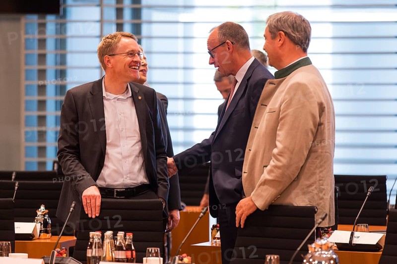Daniel Günther (Minister-President of Schleswig-Holstein), Federal Chancellor Friedrich Merz (l, CDU) and Markus Söder (CSU Chairman and Minister-President of Bavaria) in front of the meeting between Federal Chancellor Friedrich Merz and the heads of government of the federal states in the International Conference Hall of the Federal Chancellery, Berlin, 18 June 2025