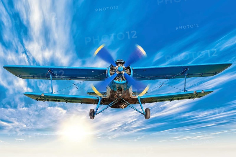 picture of a biplane in the sky