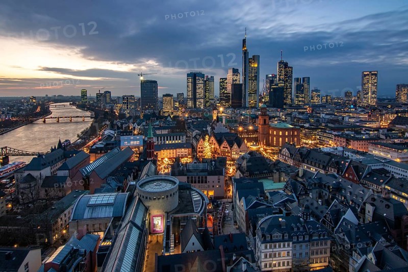The skyline of a modern city in the evening at sunset. City photo, Römerberg and the financial centre from the cathedral tower Photographed in Frankfurt am Main, Germany, Europe