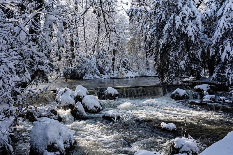 Waterfall at the Eisbach, winter with snow in the southern part of the English Garden, Munich, Bavaria, Germany, Europe