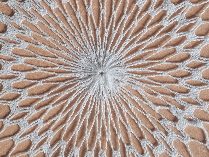 White fabric doily