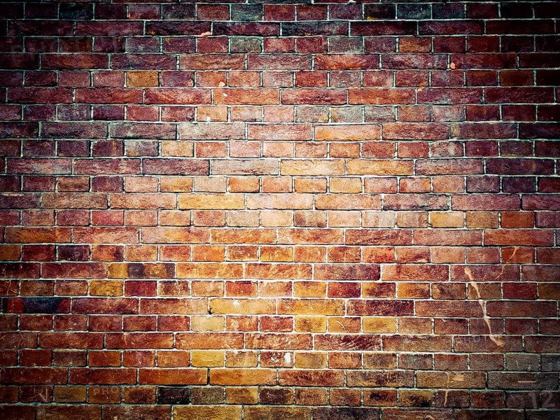 Dark brown and red old brick wall, background image