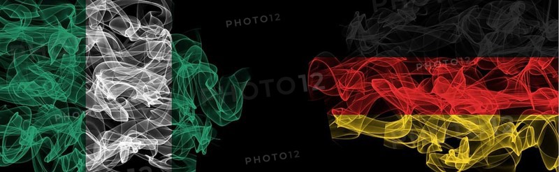 Flags of Nigeria and Germany on Black background, Nigeria vs Germany Smoke Flags