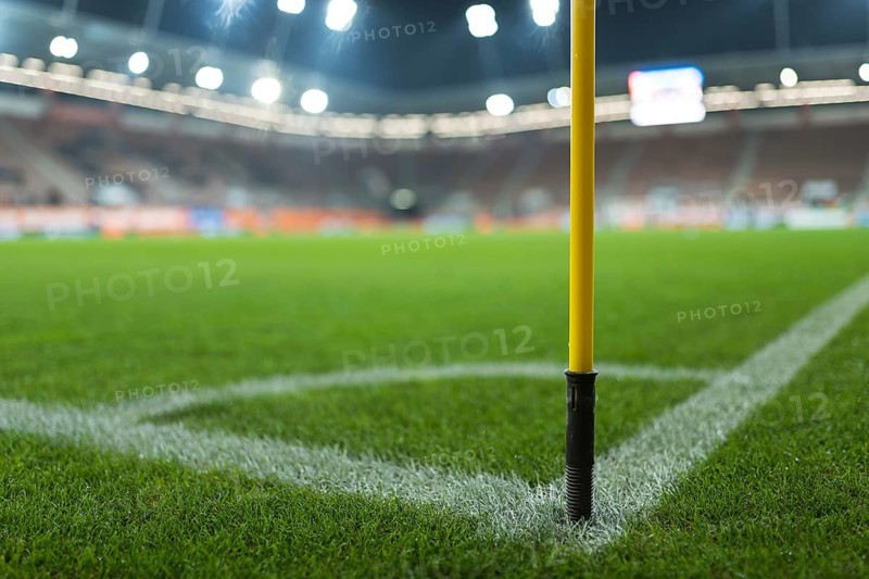 Close up flag's pole in the corner of soccer pitch