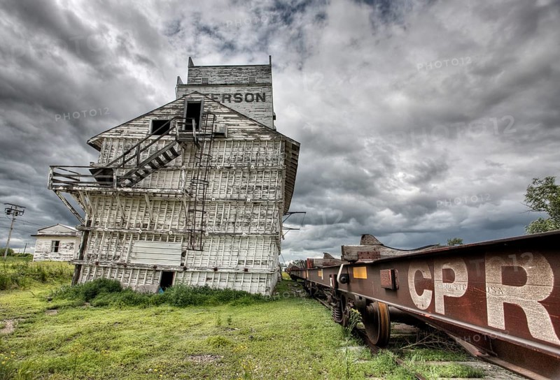 Prairie Grain Elevator in Saskatchewan Canada with storm clouds