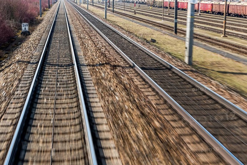 Austria, Upper Austria, Linz, Wels . Railway tracks seen from a moving train between Linz and Wels Austria, Europe