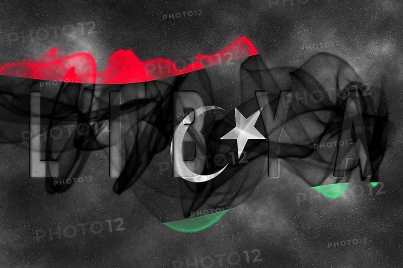 Libya Flag with Starry Background Smoke Effect