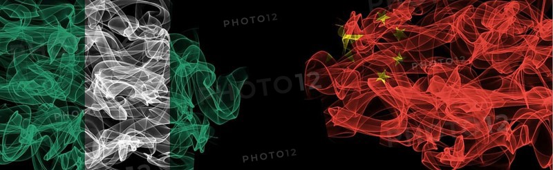Flags of Nigeria and China on Black background, Nigeria vs China Smoke Flags