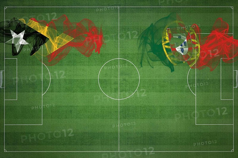 East Timor vs Portugal Soccer Match, national colors, national flags, soccer field, football game, Competition concept, Copy space
