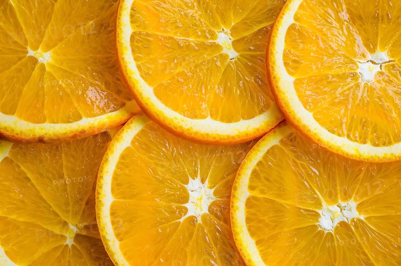 Slices of orange or tangerine isolated on white background