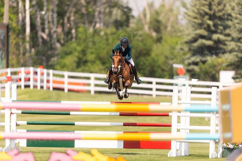 Abdulrahman Alrajhi from Saudi Arabia and riding Heartbeat W, compete in the 1.60m Grand Prix during The Continental international competition at Spruce Meadows, in Calgary, Canada, North America