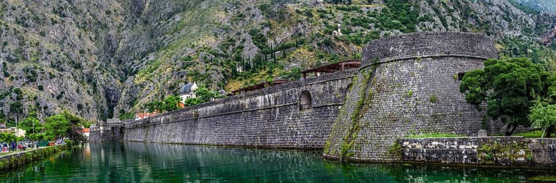 Panorama view on Kotor fortress at summer cloudy day, Kotor, Montenegro, Europe