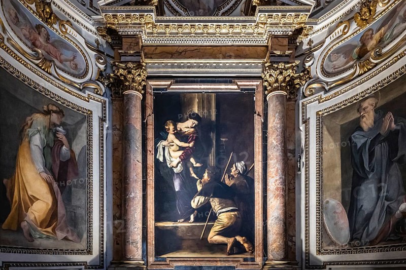 Altarpiece with the Madonna di Loreto by the Italian Baroque master Caravaggio in the Cavalletti Chapel of the Church of St Agostino in Campo Marzio near Piazza Navona in Rome