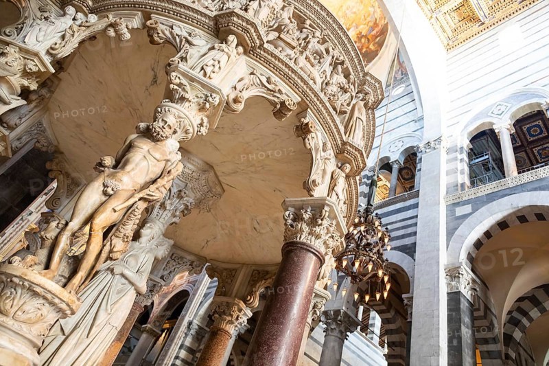 Pisa, Italy, 29 June 2023. Cathedral interior. The pulpit, Medieval art masterpiece by sculptor Giovanni Pisano, 1310, Europe