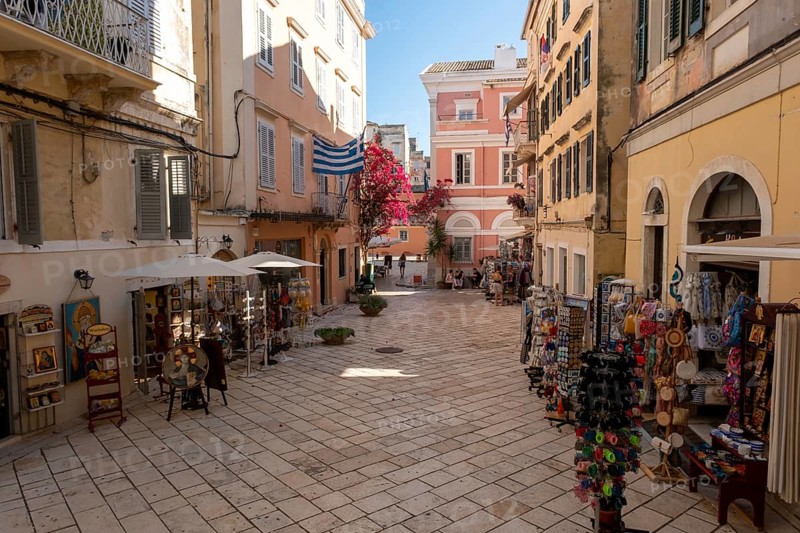 A street scene in Corfu Town on the Greek island of Corfu in the Ionian Sea, known for its pastel-colored Venetian architecture