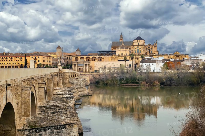 View of Mosque Cathedral of Cordoba from Roman Bridge, Spain, Europe