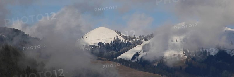 Snow capped hills near Gstaad, Switzerland, Europe