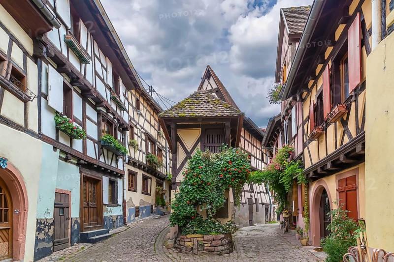 Picturesque historical street in Eguisheim, Alsace, France, Europe