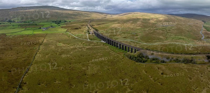 Ribblehead Viaduct, railway viaduct in the Yorkshire Dales, behind Whernside mountain, drone shot, Carnforth, England, Great Britain