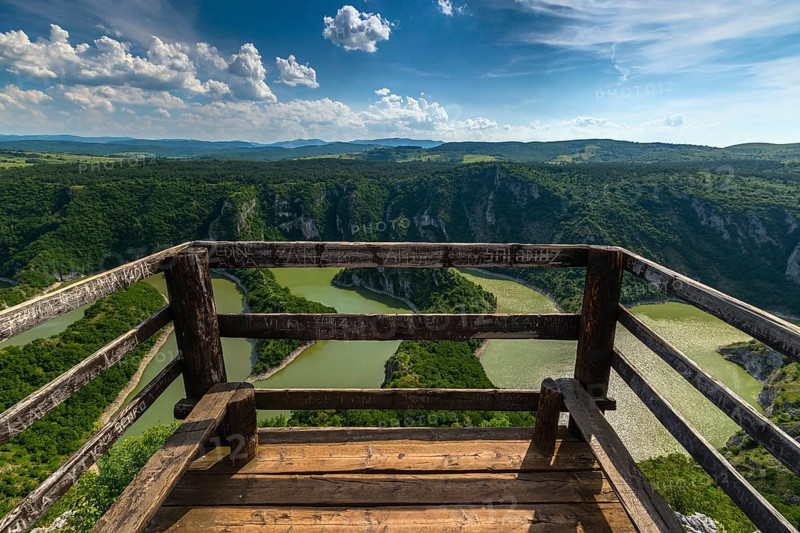 Viewpoint of meanders at rocky river Uvac gorge on sunny day, southwest Serbia