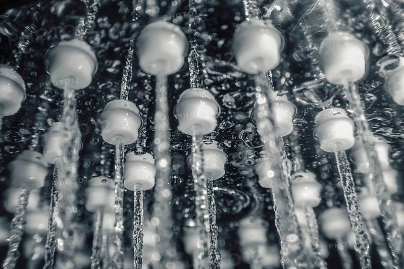 Shower head with running water closeup