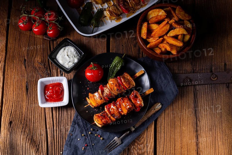 Marinated kebabs with meat and vegetables