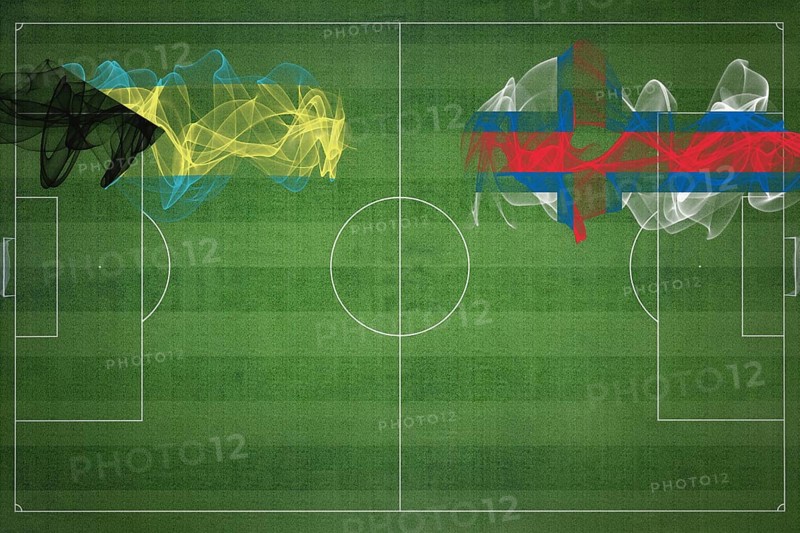 Bahamas vs Faroe Islands Soccer Match, national colors, national flags, soccer field, football game, Competition concept, Copy space