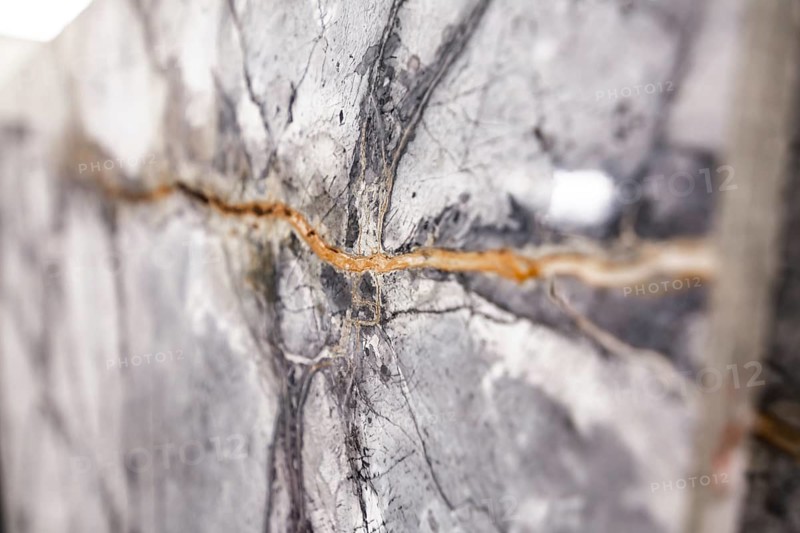 Detailed view of gray stone with a visible crack, stone, natural stone, stone structure
