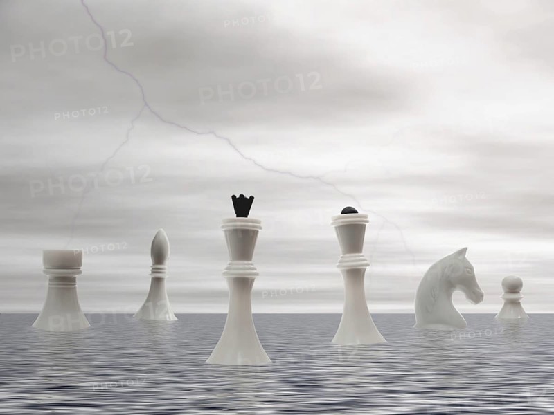 White chess mans advent by sea under the storming sky