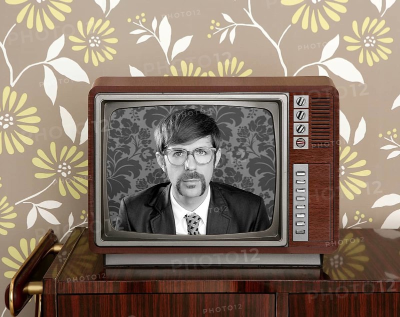 Nerd retro 60s vintage tv presenter hero on wood television wallpaper