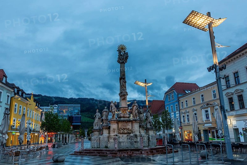 Evening atmosphere, rain clouds over the main square, plague column column, Leoben, Styria, Austria, Europe