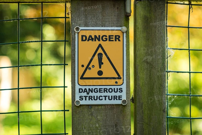 Sign: Dangerous structure, seen in Oare near Faversham, Kent, England, UK