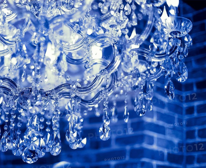 Chrystal chandelier close up. Glamour background with copy space