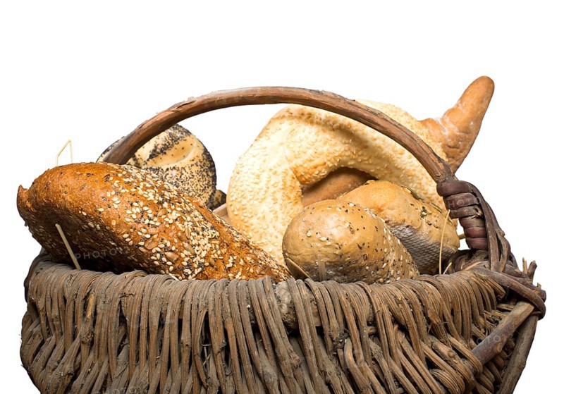 Bread in basket. White isolated