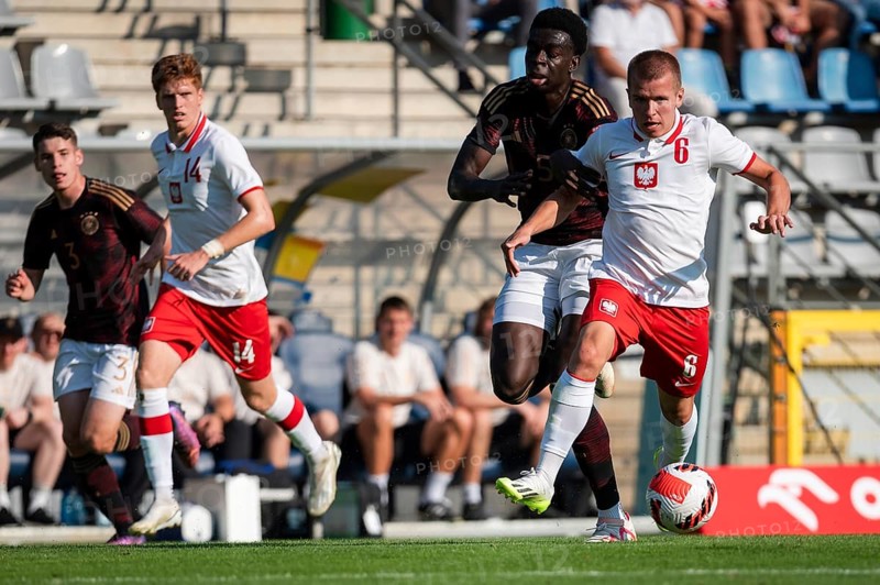 LEGNICA, POLAND - SEPTEMBER 11, 2023: Friendly football match under 20 Elite League Poland vs Germany 1:1. In action Joshua Quarshie (L) Antoni Kozubal (R).