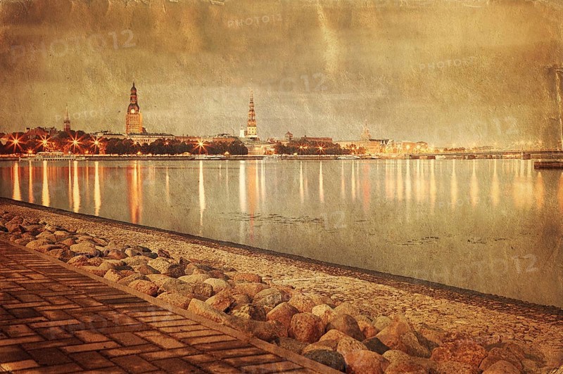 Retro style image of night Riga cityscape. Latvia