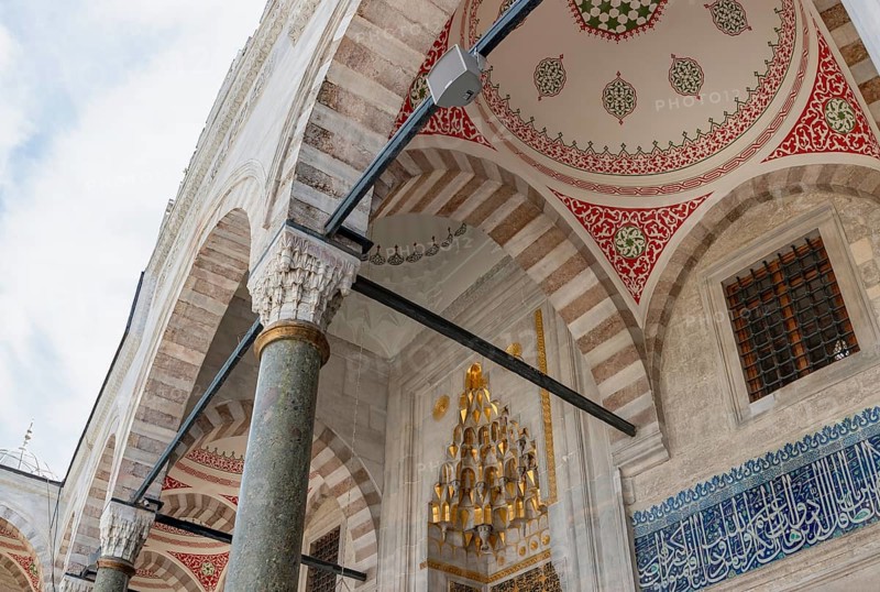 A picture of the colorful and gorgeous gateway to the New Mosque, in Istanbul