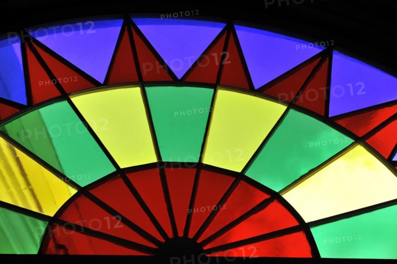 View of a colourful, wheel-shaped stained glass window with colourful segments, Havana, Cuba, Central America