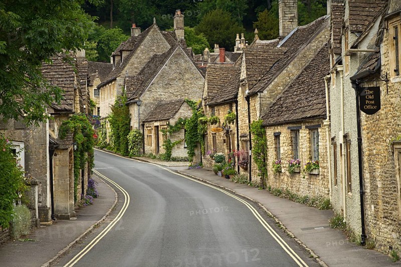 Cottages and main street in Castle Combe, Cotswolds, UK