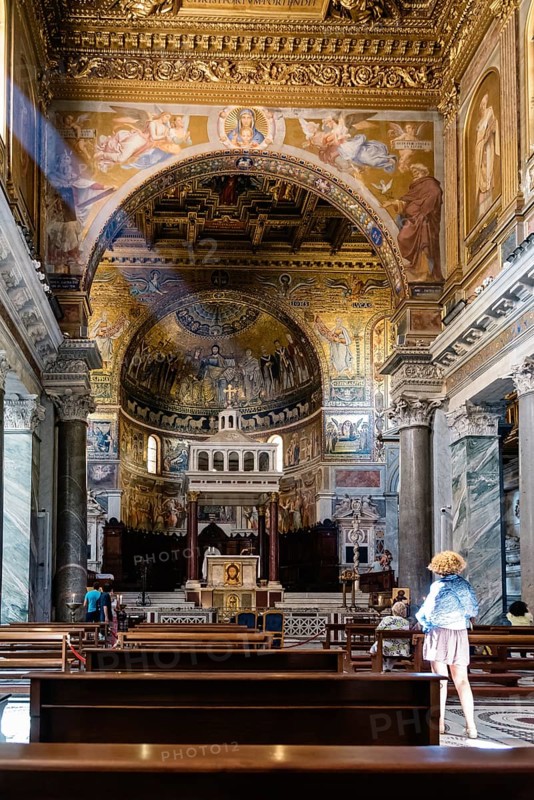 Rome, Italy, August 18, 2016: Interior view of church of Santa Maria in Trastevere. It is a titular minor basilica in the Trastevere district of Rome, and one of the oldest churches of Rome, Europe