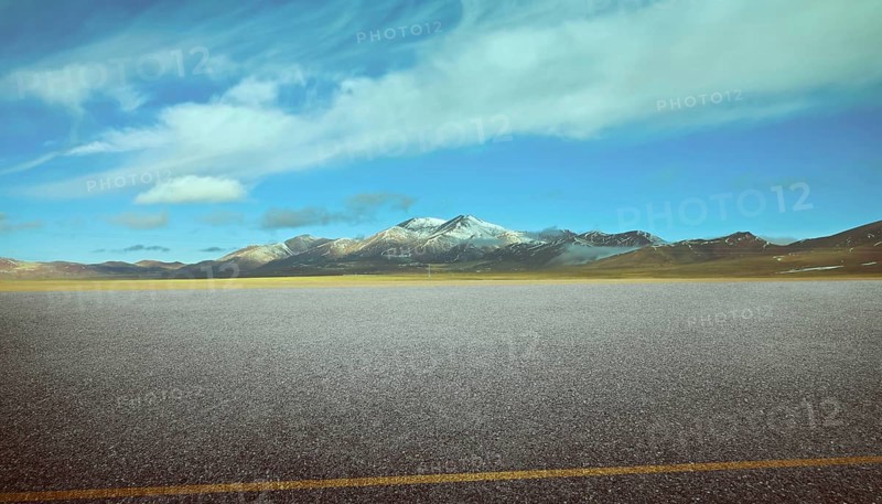 View of the empty asphalt road with beautiful mountain landscape
