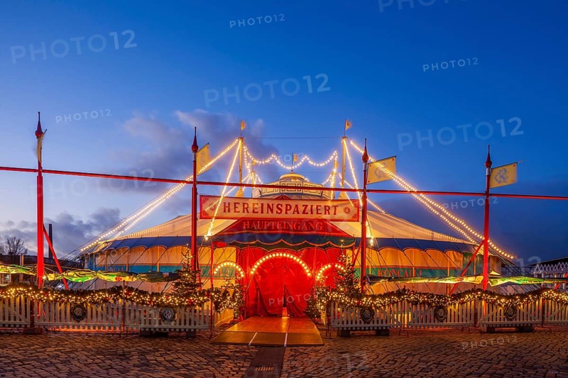 Circus Roncalli with Christmas lights at dusk on the Bürgerweide, Bremen, Germany, Europe