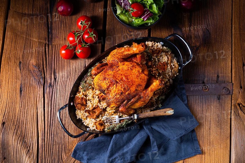 Grilled spicy chicken with pearl barley and mushrooms