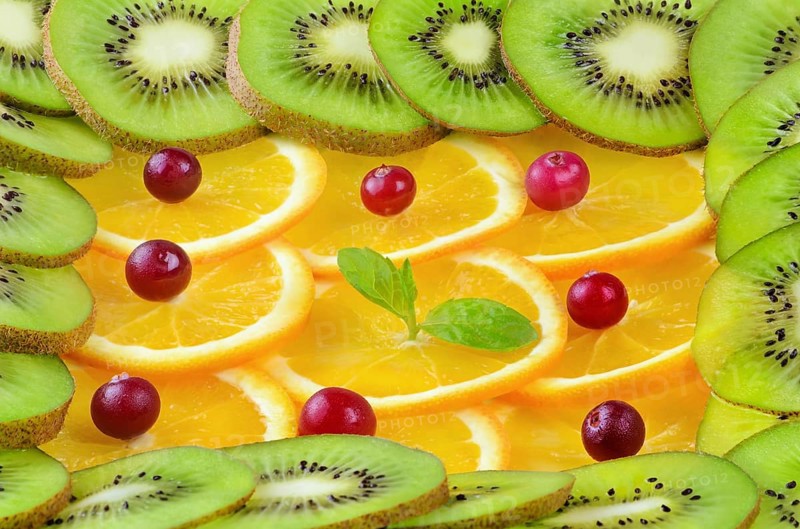 Background From Sliced Fruits, Red Bilberry And Mint Daugavpils, Latvia, Europe