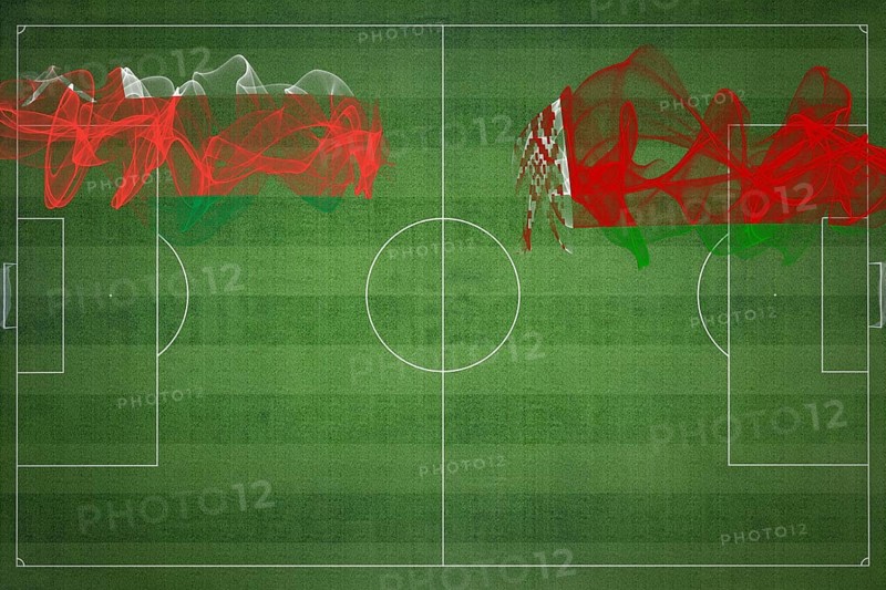 Oman vs Belarus Soccer Match, national colors, national flags, soccer field, football game, Competition concept, Copy space