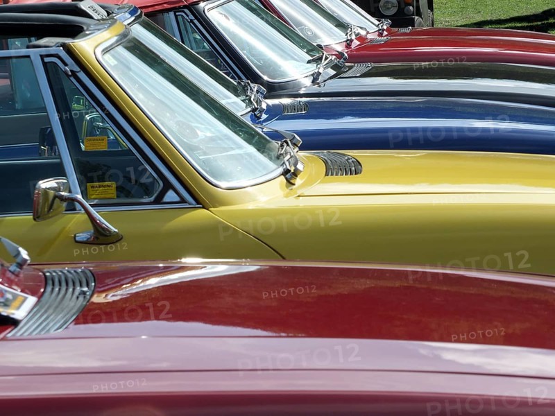 Hebden Bridge, West Yorkshire, England, August 4 2018: Close up of the bonnets and windscreens of a row of vintage triumph stag sports cars at hebden bridge vintage weekend public vehicle show
